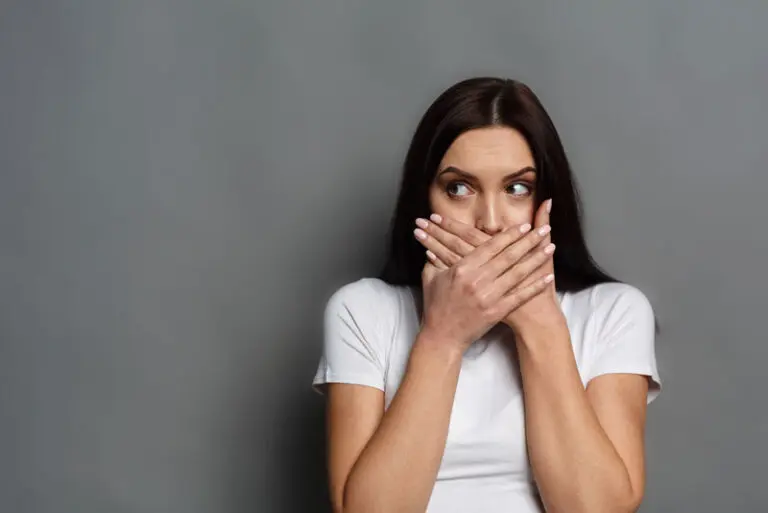 Dental Patient Hiding Her Missing Tooth