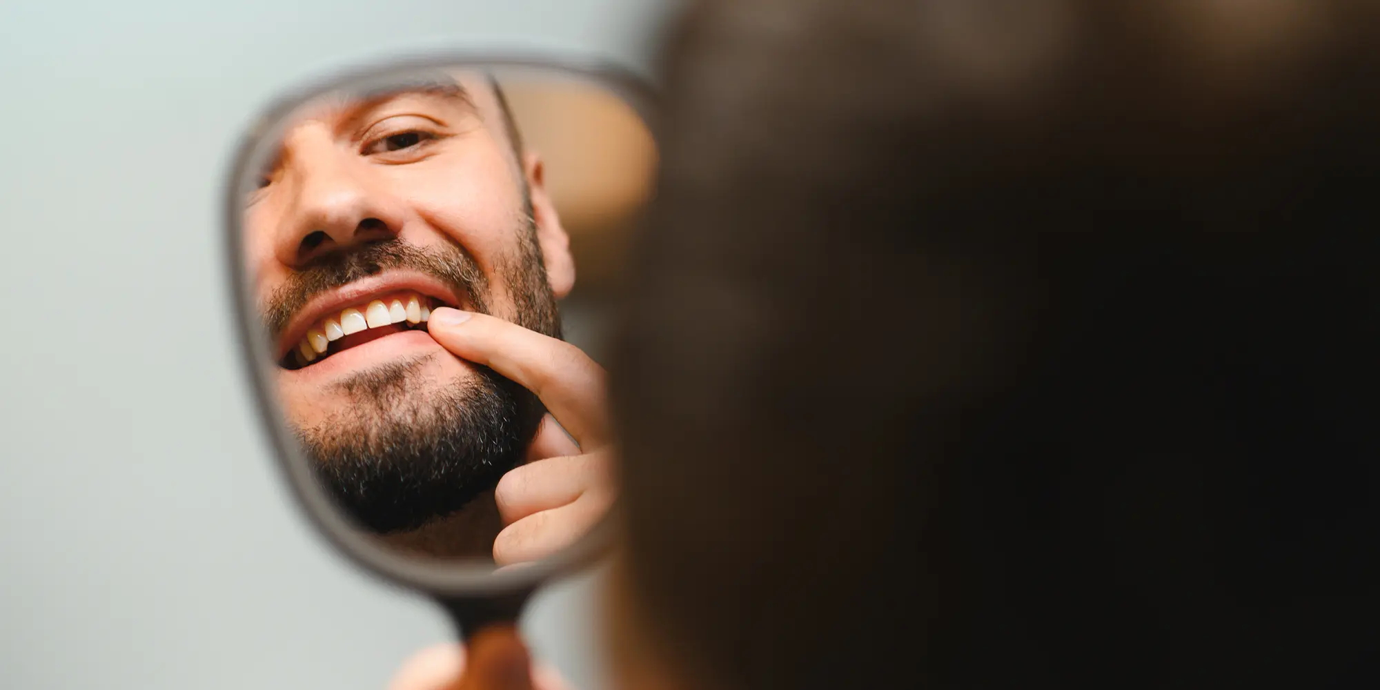 Why Are My Gums Pulling Away From My Teeth?