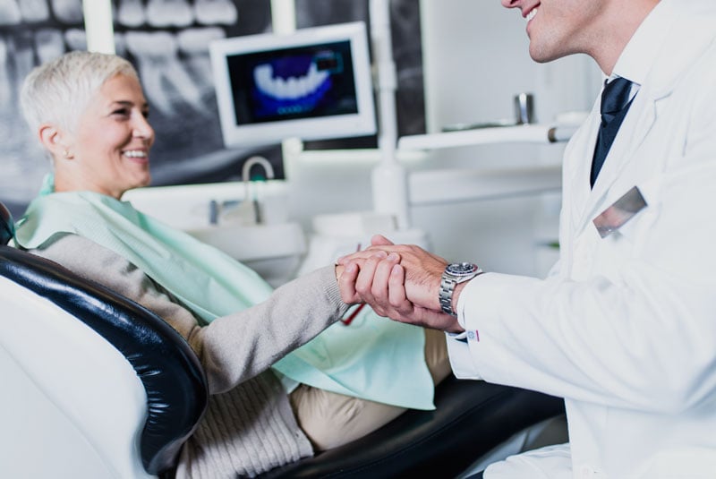 Dental Implant Patient Smiling After Her Procedure