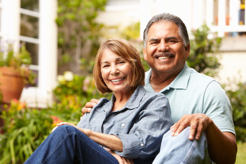 Two Dental Implant Patients Smiling Together