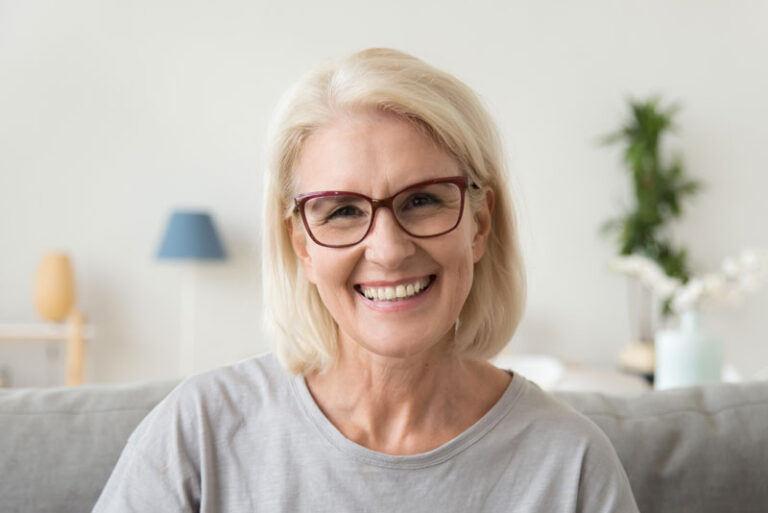 Dental Patient Smiling With Her Dental Implants