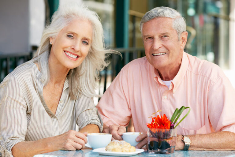 dental patients enjoying a meal with their dental implants