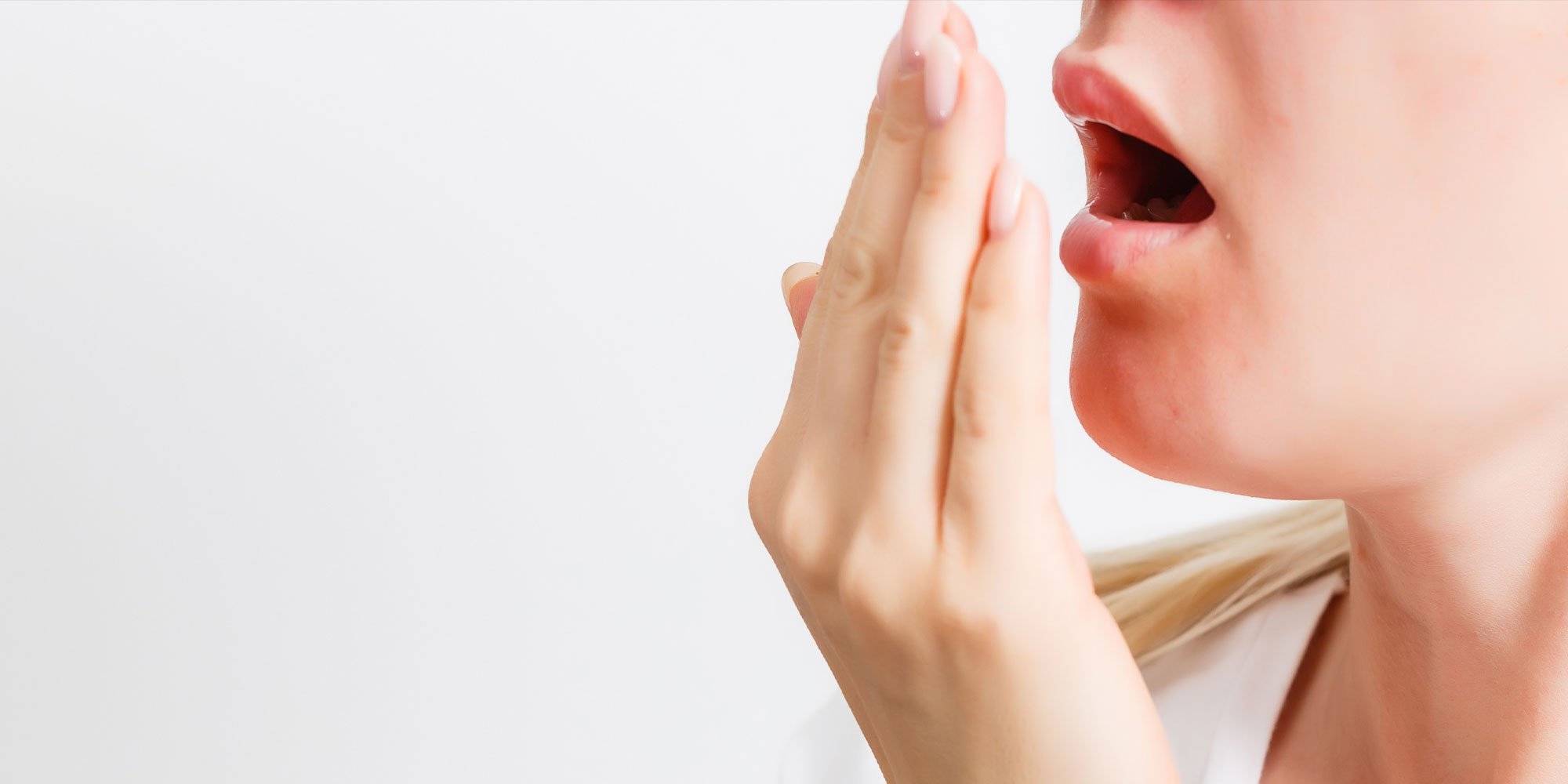 dental patient smelling their own breath