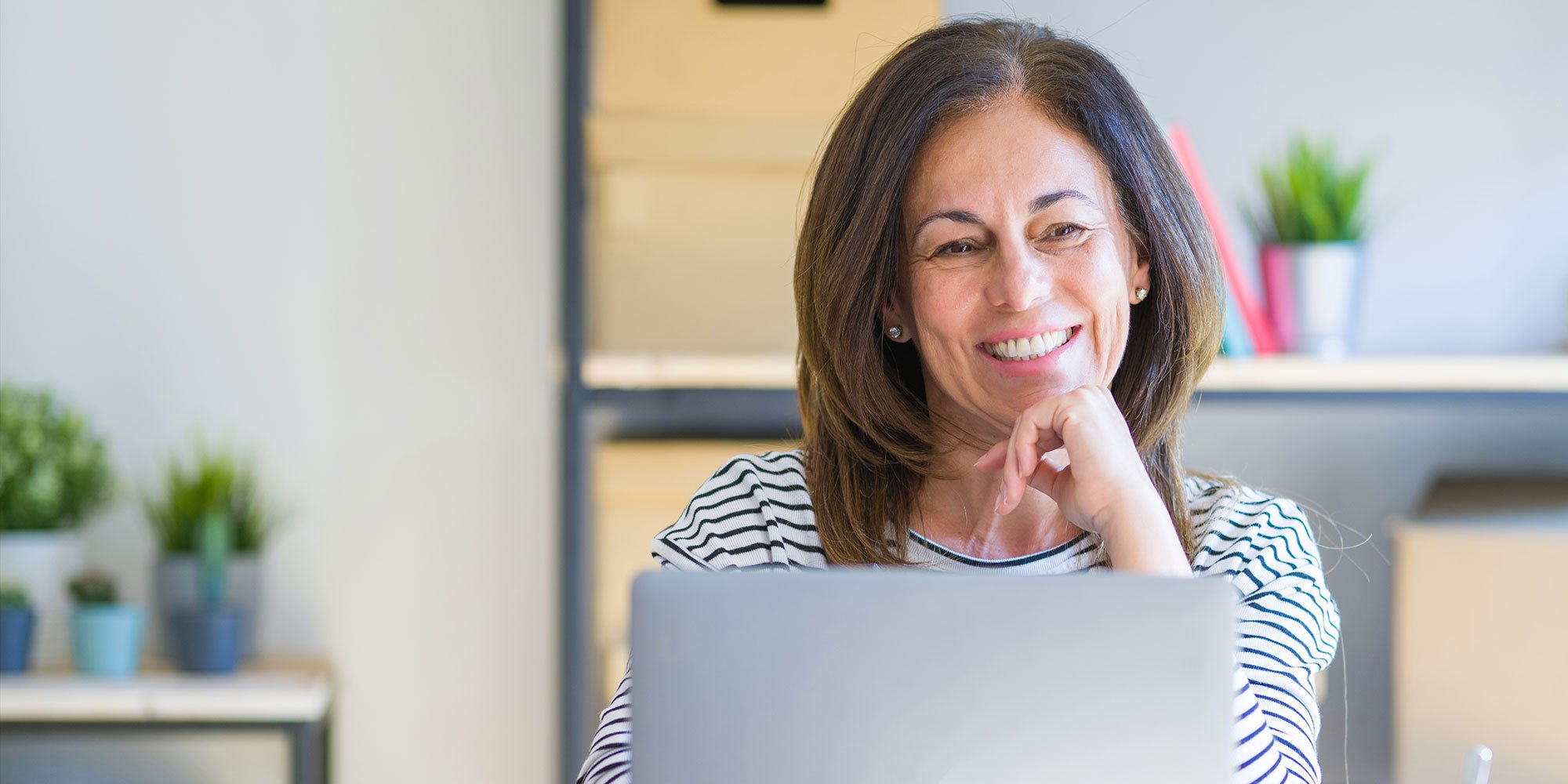 woman using computer to schedule dental appointment