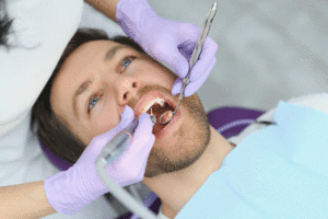 Closeup Shot Of Smiling Man Getting Treatment.