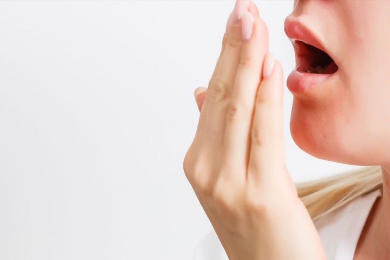 dental patient smelling their own breath